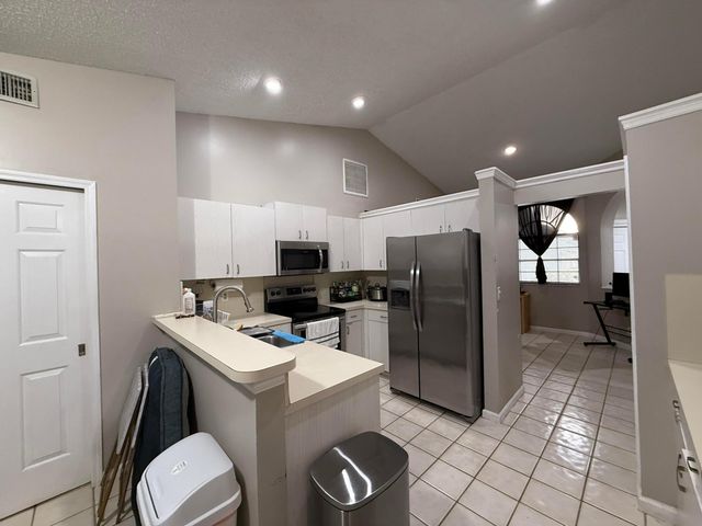 13025 MEADOWBREEZE Drive, Wellington, FL 33414