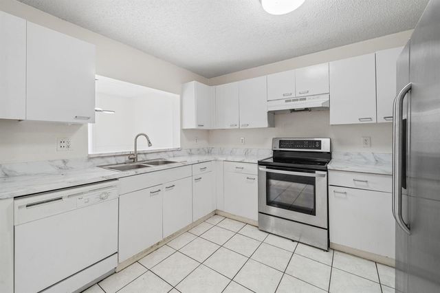 5072 Pine Abbey Drive S, West Palm Beach, FL 33415