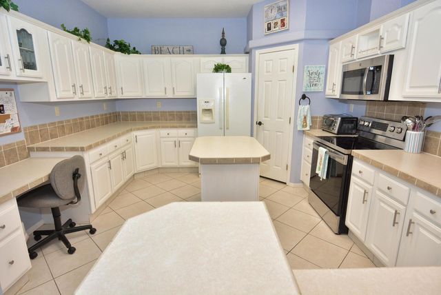 8154 14th Hole Drive, Port St. Lucie, FL 34952