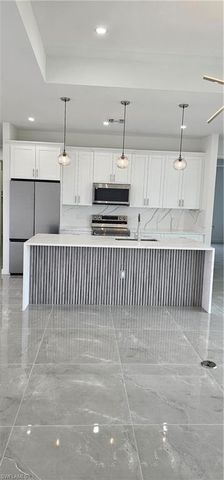 402 NW 10th ST, Cape Coral, FL 33993