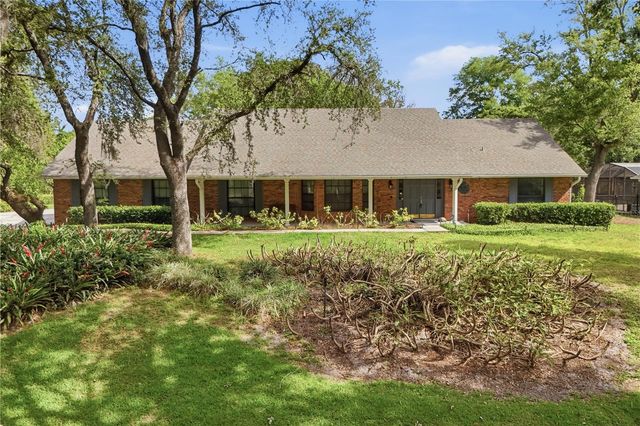 7141 WOODED VILLAGE LANE, Orlando, FL 32835