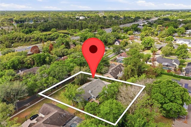 7141 WOODED VILLAGE LANE, Orlando, FL 32835