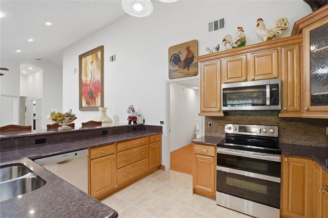 7141 WOODED VILLAGE LANE, Orlando, FL 32835