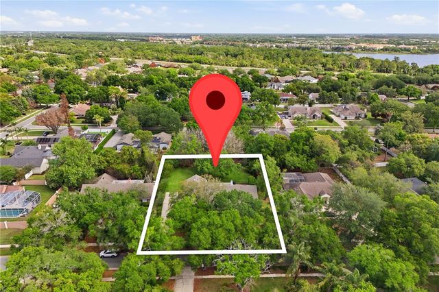 7141 WOODED VILLAGE LANE, Orlando, FL 32835