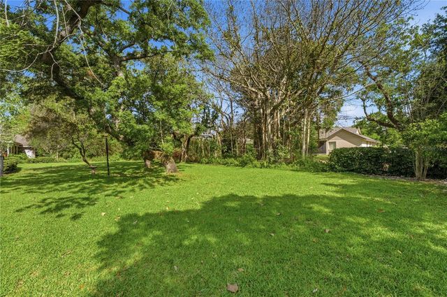 7141 WOODED VILLAGE LANE, Orlando, FL 32835