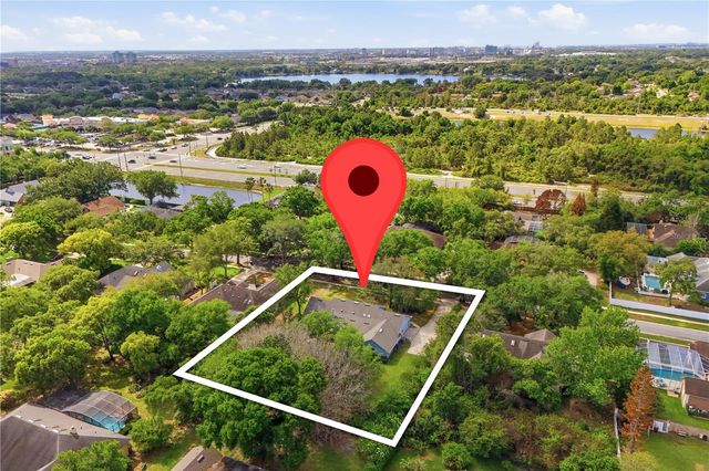 7141 WOODED VILLAGE LANE, Orlando, FL 32835