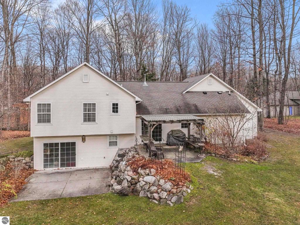 Image 1 of property listing at 9685 Woodys Run, Traverse City, MI 49684