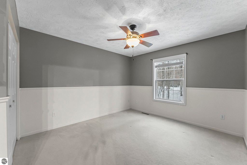 Image 32 of property listing at 9685 Woodys Run, Traverse City, MI 49684