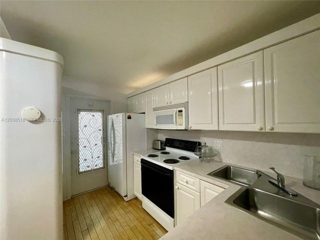 450 Paradise Isle Boulevard 205, Hallandale Beach, FL 33009