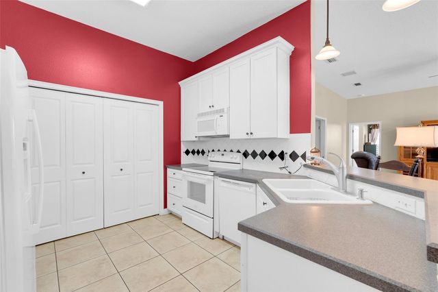 14100 HUNTERS TRACE LANE, Clermont, FL 34715