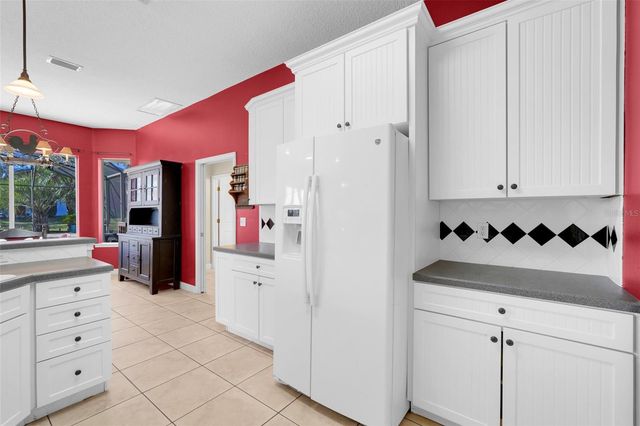 14100 HUNTERS TRACE LANE, Clermont, FL 34715