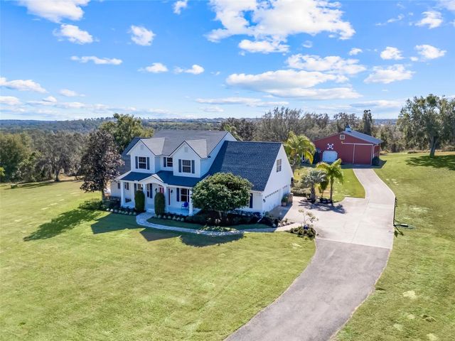 14100 HUNTERS TRACE LANE, Clermont, FL 34715