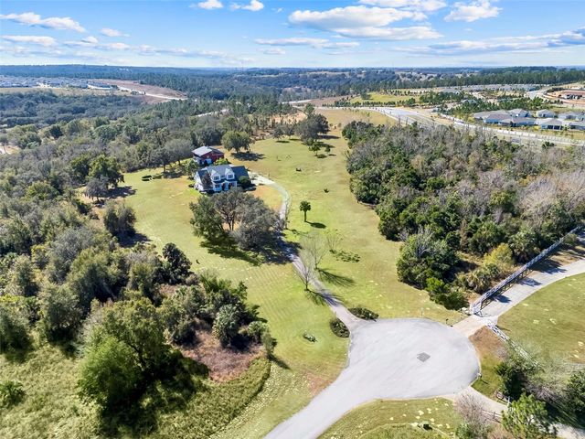 14100 HUNTERS TRACE LANE, Clermont, FL 34715