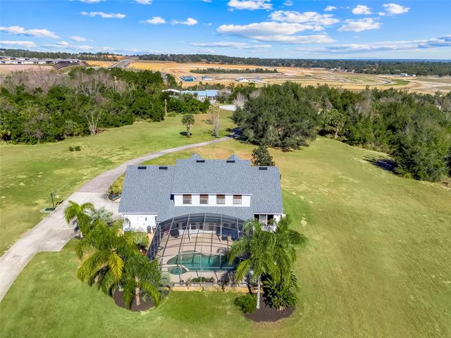 14100 HUNTERS TRACE LANE, Clermont, FL 34715