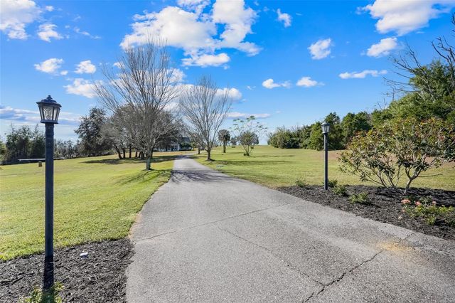 14100 HUNTERS TRACE LANE, Clermont, FL 34715