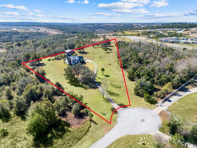 14100 HUNTERS TRACE LANE, Clermont, FL 34715