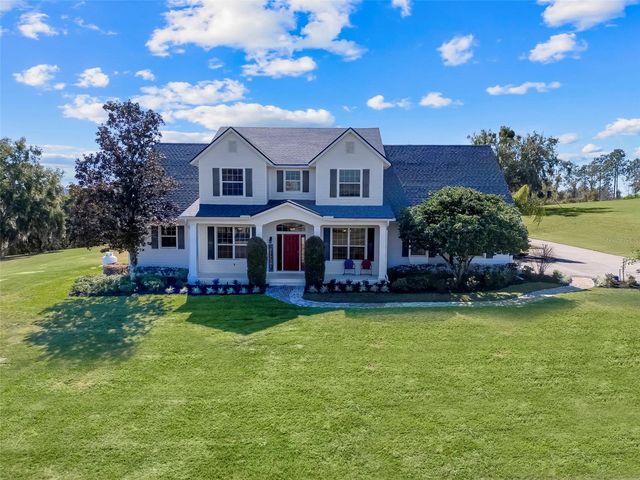 14100 HUNTERS TRACE LANE, Clermont, FL 34715