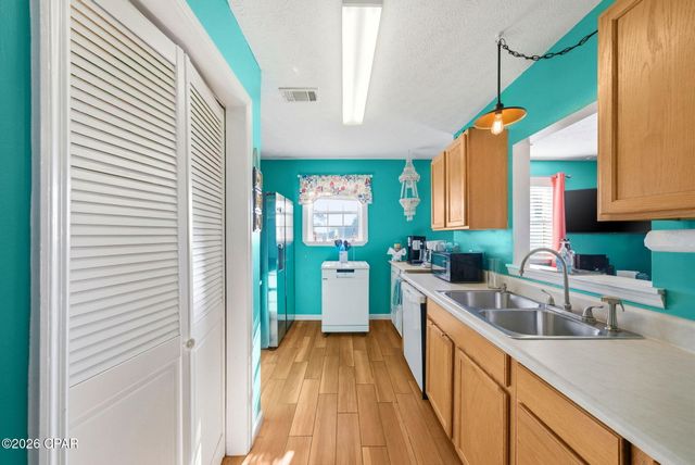 320 El Reposo Place, Panama City Beach, FL 32413