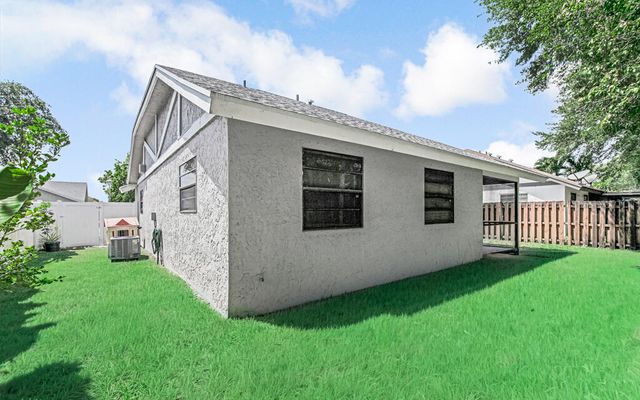 23428 Country Club Drive E, Boca Raton, FL 33428