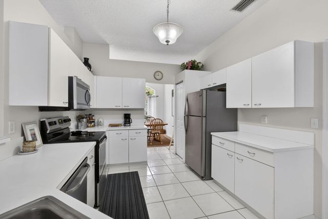 7595 Hollington Place, Greenacres, FL 33467