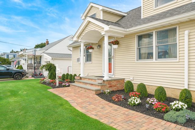 16 Kensington Avenue, Massapequa, NY 11758