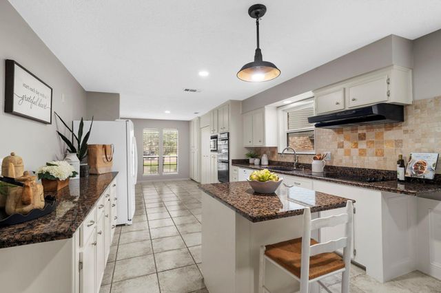 8206 Colonial Oaks Lane, Spring, TX 77379