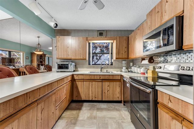 1128 W Rainwood Cir W, Palm Beach Gardens, FL 33410