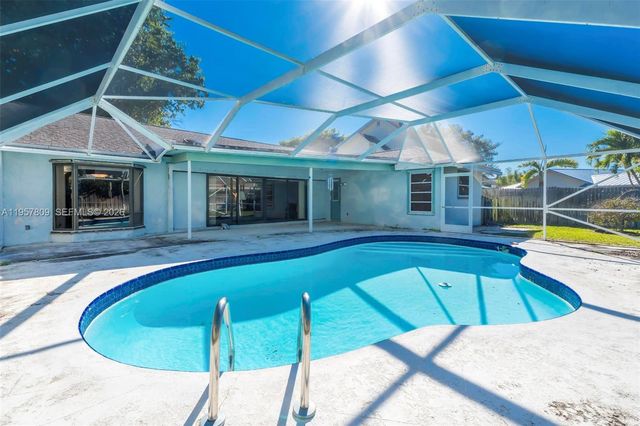 1128 W Rainwood Cir W, Palm Beach Gardens, FL 33410