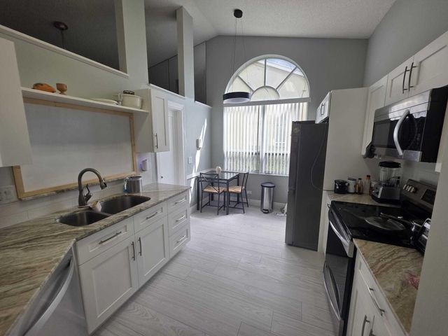 6201 Pond Tree Court, Greenacres, FL 33463