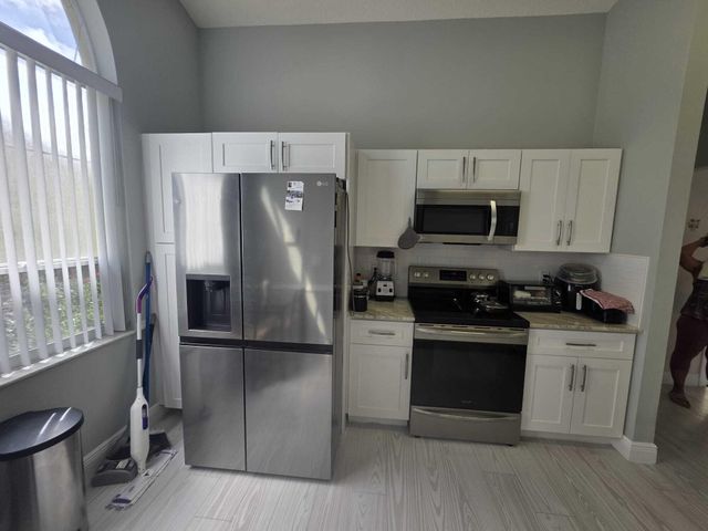 6201 Pond Tree Court, Greenacres, FL 33463