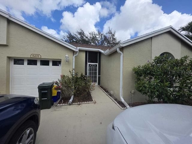 6201 Pond Tree Court, Greenacres, FL 33463