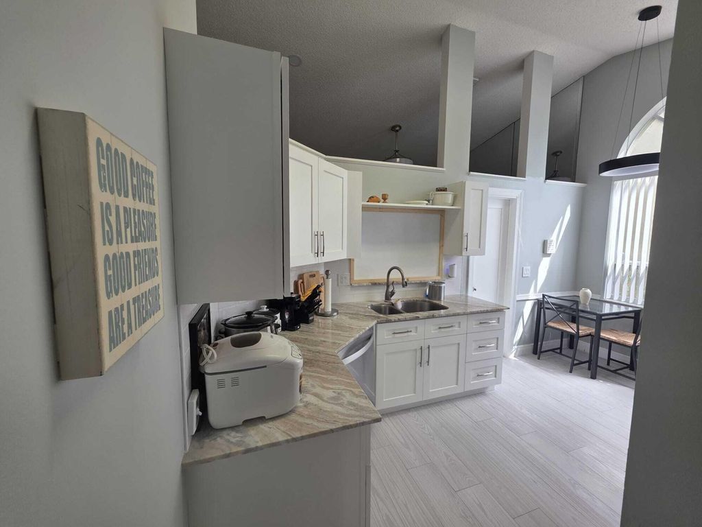 6201 Pond Tree Court, Greenacres, FL 33463