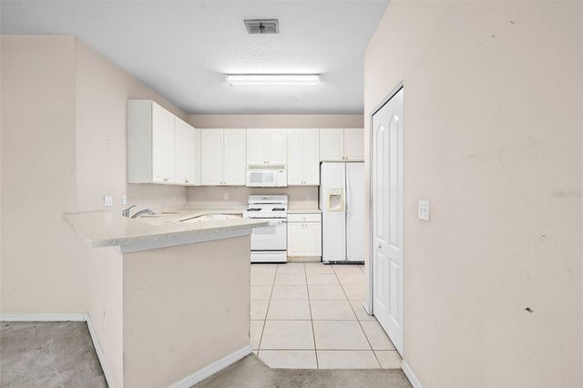 1204 HUNTINGTON GREENS DRIVE 1204, Sun City Center, FL 33573