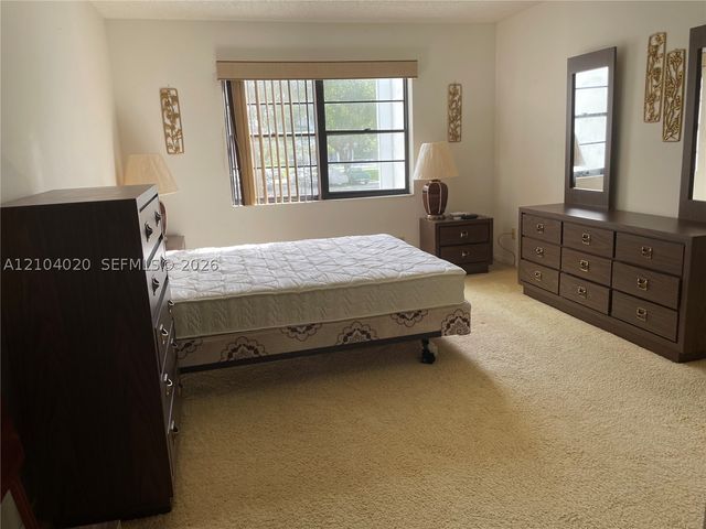 9235 SW 8th St 209, Boca Raton, FL 33428