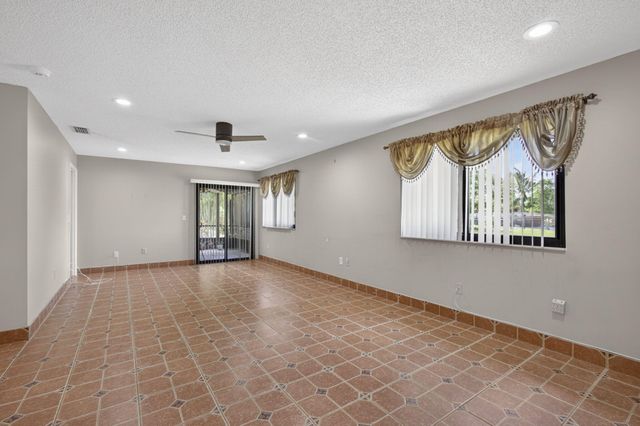 67 Macadamia Court, Royal Palm Beach, FL 33411