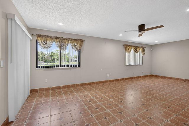 67 Macadamia Court, Royal Palm Beach, FL 33411