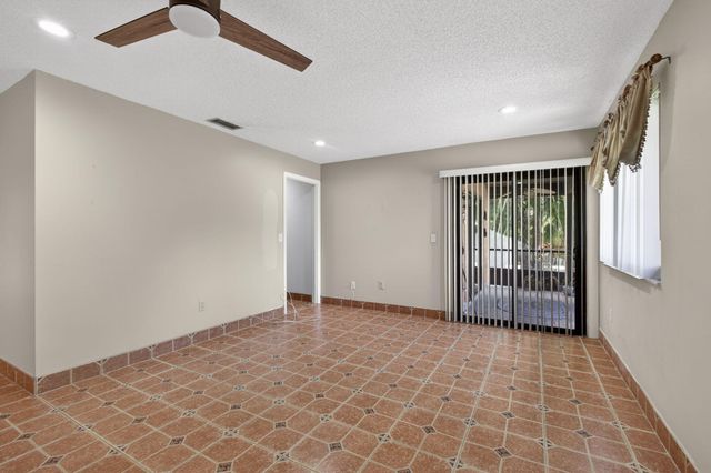 67 Macadamia Court, Royal Palm Beach, FL 33411
