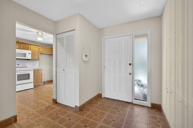 67 Macadamia Court, Royal Palm Beach, FL 33411