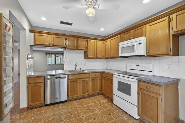 67 Macadamia Court, Royal Palm Beach, FL 33411