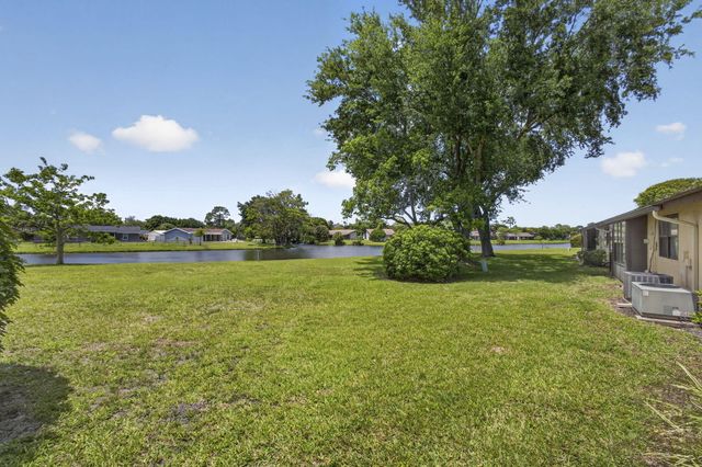 67 Macadamia Court, Royal Palm Beach, FL 33411