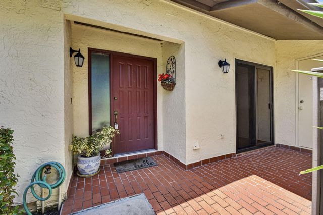 67 Macadamia Court, Royal Palm Beach, FL 33411