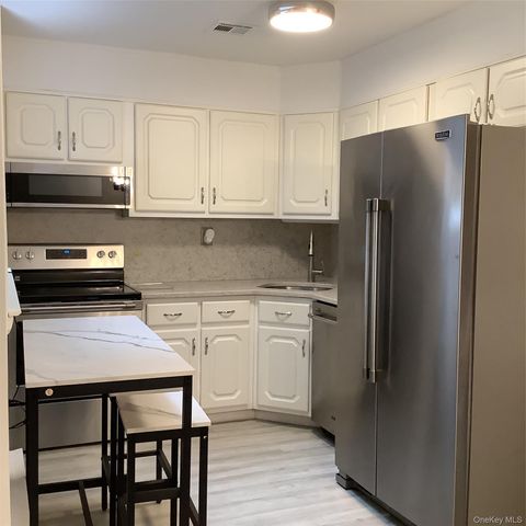 406 Woodbridge Drive B, Ridge, NY 11961
