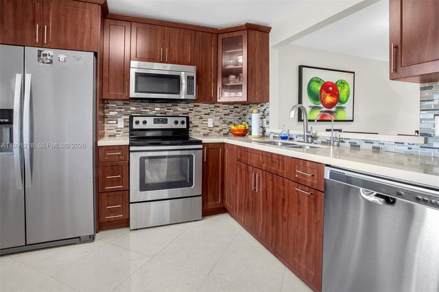 304 Racquet Club Rd 203, Weston, FL 33326