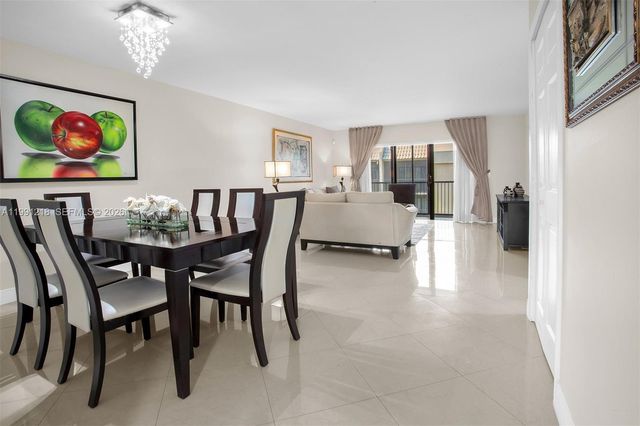 304 Racquet Club Rd 203, Weston, FL 33326