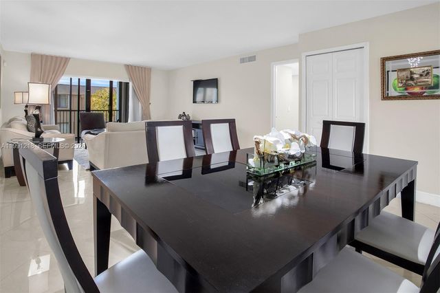 304 Racquet Club Rd 203, Weston, FL 33326