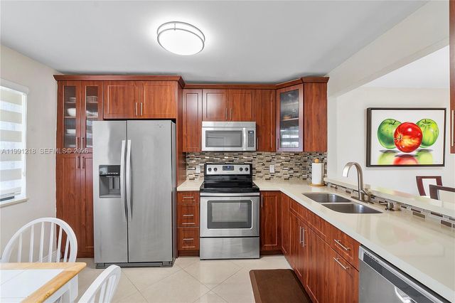 304 Racquet Club Rd 203, Weston, FL 33326