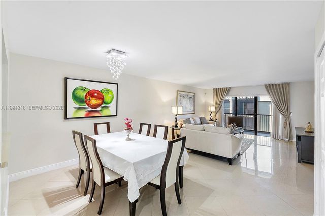 304 Racquet Club Rd 203, Weston, FL 33326