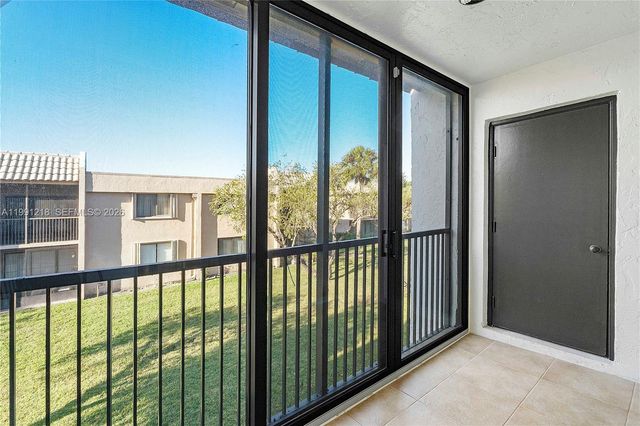 304 Racquet Club Rd 203, Weston, FL 33326