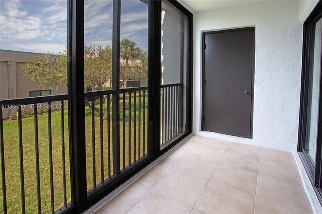 304 Racquet Club Rd 203, Weston, FL 33326