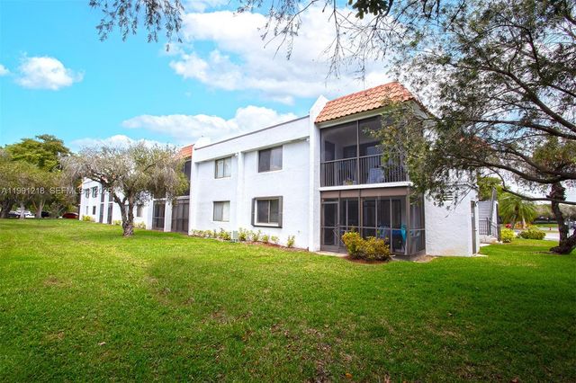 304 Racquet Club Rd 203, Weston, FL 33326